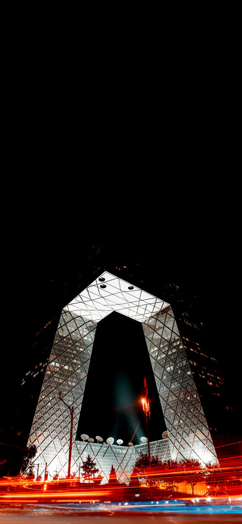 view of CCTV Headquarters with a large arch in the middle