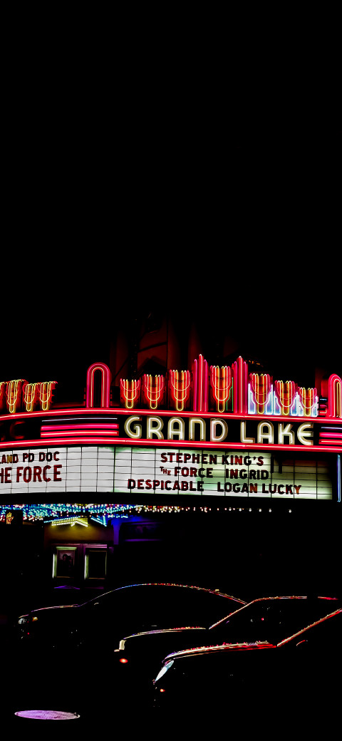 image of a theater marquee lit up at night