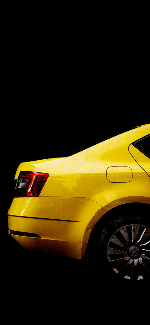 yellow car with black background