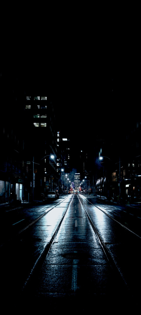 city street at night with a street lights