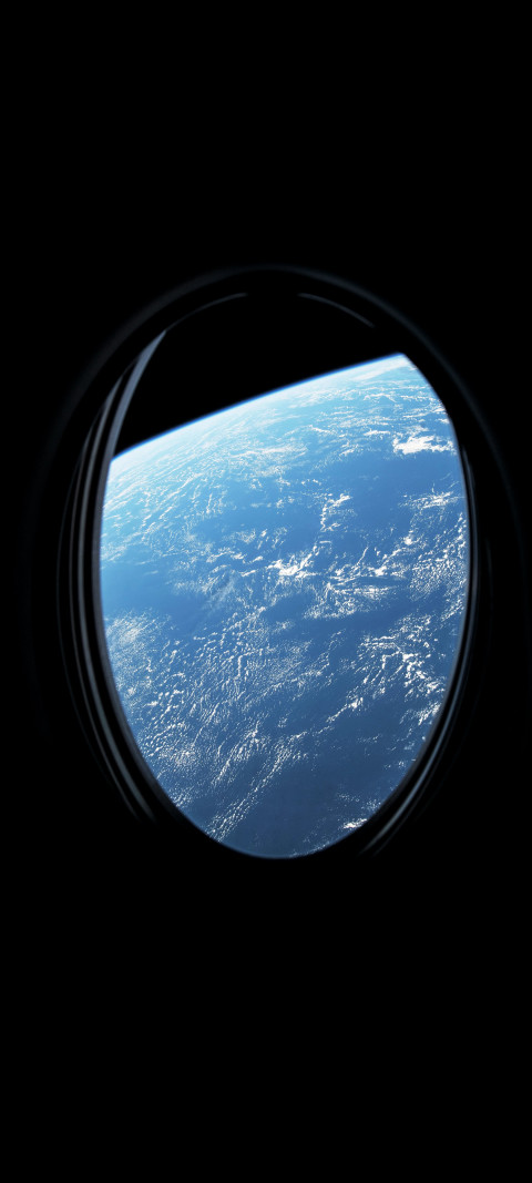 earth from a window of a plane