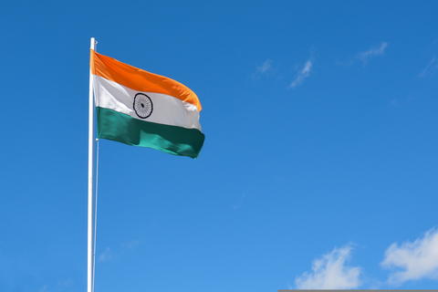 Free photo of The national flag of India under blue sky