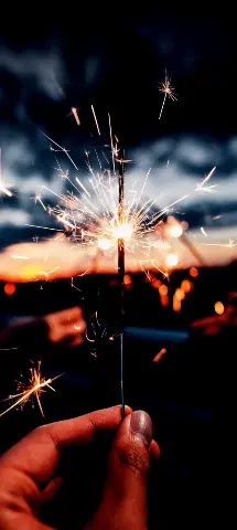 Misc  Amoled Wallpaper with Sparkler, Hand & Sky