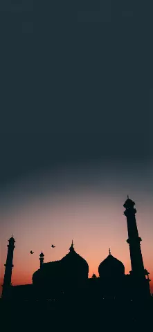 silhouette view of mosque at sunset