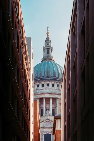 St. Paul's Cathedral Dome Viewed Between Modern Buildings