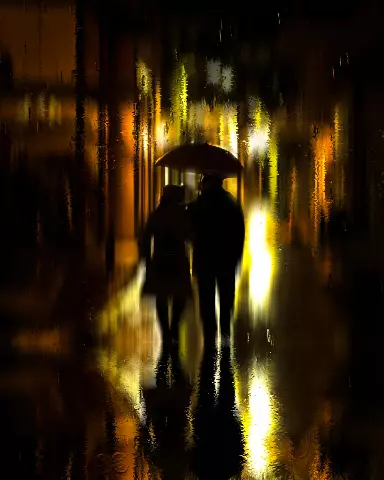 two people walking down the street with an umbrella